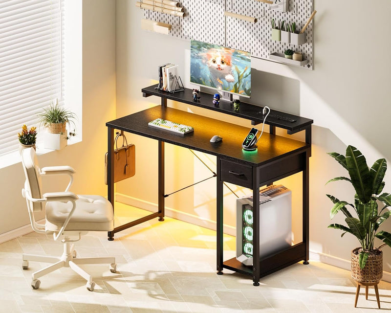 AODK Gaming Desk with LED Lights & Power Outlet, 40 Inch Computer Desk with Drawer, Reversible Desk with Adjustable Monitor Shelf & Headphone Hook for Home Office, Black