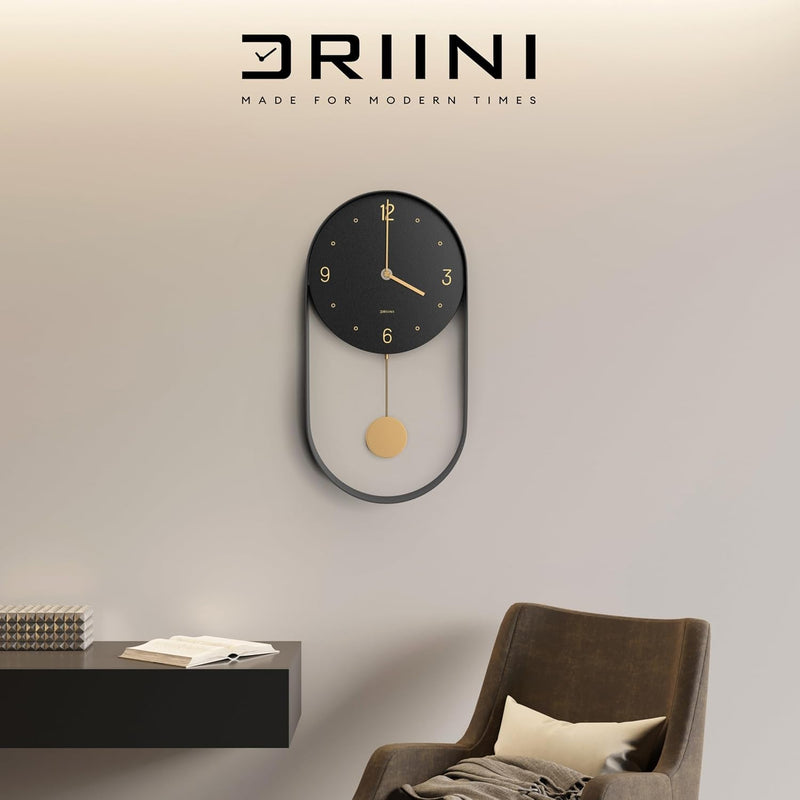 Driini Modern Pendulum Wall Clock - Decorative and Unique Metal Frame, with 8 Inch Face - Contemporary, Minimalist Design, with Silent Battery Operation - Includes Both Black and Gold Pendelum