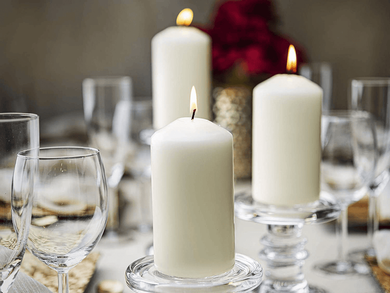 BOLSIUS Set of 12 Ivory Pillar Candles - Unscented 43 Hour Long Lasting Candles - 2.75-x 5-inch Dripless Clean Burning Smokeless Dinner Candle - Perfect for Weddings Parties and Special Occasions