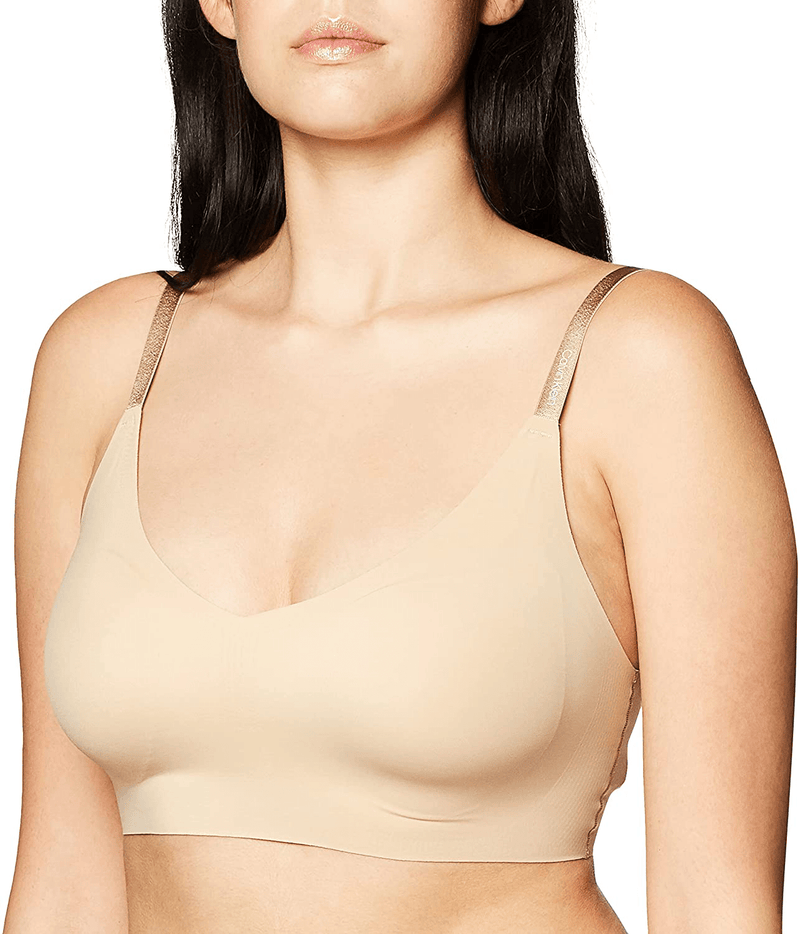 Calvin Klein Women's Invisibles Comfort Seamless Wirefree Lightly Lined Triangle Bralette Bra Apparel & Accessories > Clothing > Underwear & Socks > Bras Calvin Klein Bare Large 