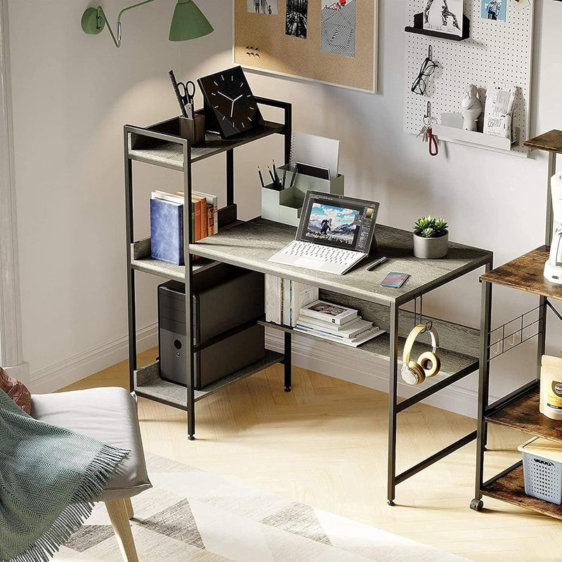 Bestier Computer Office Desk with Steel Frame, Reversible Book Shelves, Headphone Hook, Adjustable Feet, & under Desk Storage, Grey