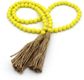 CVHOMEDECO. Wood Beads Garland with Tassels Farmhouse Rustic Wooden Prayer Bead String Wall Hanging Accent for Home Festival Decor. Black Home & Garden > Decor > Seasonal & Holiday Decorations CVHOMEDECO. Yellow  