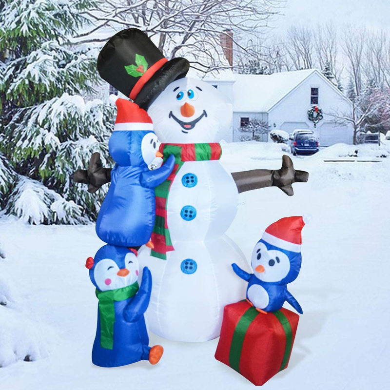 GOOSH 6 FT Height Christmas Inflatables Outdoor Snowman with Three Penguins, Blow Up Yard Decoration Clearance with LED Lights Built-in for Holiday/Christmas/Party/Yard/Garden