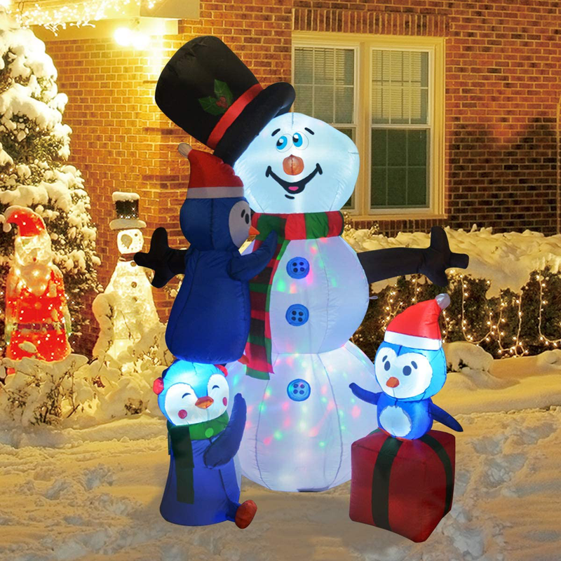GOOSH 6 FT Height Christmas Inflatables Outdoor Snowman with Three Penguins, Blow Up Yard Decoration Clearance with LED Lights Built-in for Holiday/Christmas/Party/Yard/Garden