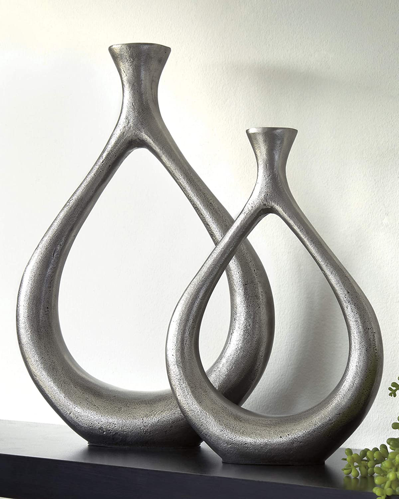Signature Design by Ashley Dimaia Contemporary 2 Piece Metal Candle Holder Set, Silver Finish Home & Garden > Decor > Vases Signature Design by Ashley   