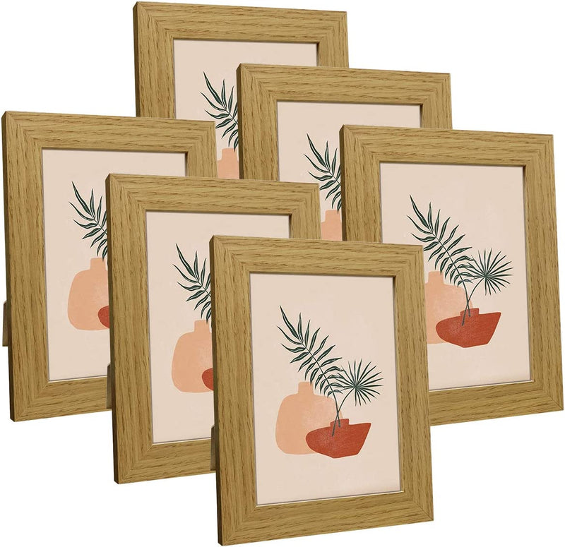 Q.Hou 8X10 Picture Frame Wood Patten Rustic Brown Photo Frames Packs 4 with High Difinition Glass for Tabletop or Wall Decor (QH-PF8X10-BR) Home & Garden > Decor > Picture Frames Q.Hou Oak 5x7 