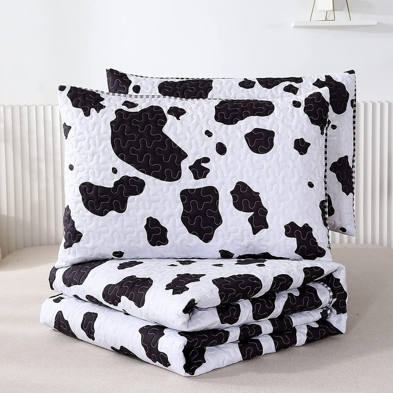 PERFEMET Black and White Cow Print Quilt Set King Size Bedding Set Reversible Bedroom Decorations for Kids and Teens Bedspread Set(King,1 Quilt + 2 Pillow Cases) Home & Garden > Linens & Bedding > Bedding PERFEMET   