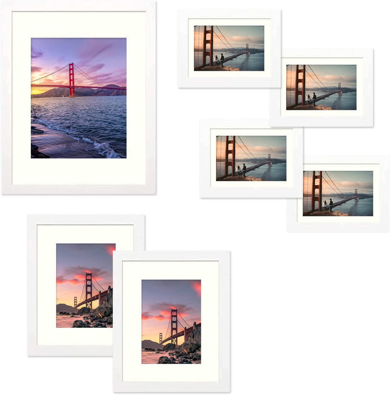 Frametory, Gallery Wall Frame Set of 7 Multiple Sizes 11X14, 8X10, 5X7 Picture Frame Collage with Ivory Color Mat for Prints, with Real Glass (Blue) Home & Garden > Decor > Picture Frames Frametory White 7 Pack 