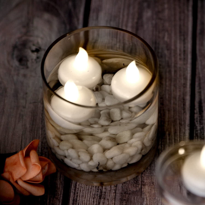AGPTEK 12 PCS Waterproof Tea Lights, Battery Operated Flameless Floating Candles for Wedding Party Decoration - Warm White Home & Garden > Pool & Spa > Pool & Spa Accessories MamBate   