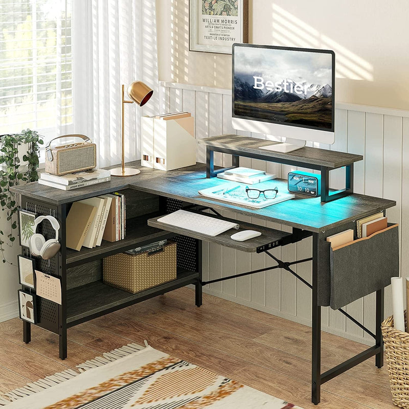 Bestier 55" L Shaped Computer Desk with Enclosed Shelves and Pegboard, Corner Home Office Desk with Keyboard Tray, LED Monitor Stand and Side Storage Bag (Retro Grey Oak) Home & Garden > Household Supplies > Storage & Organization Bestier   