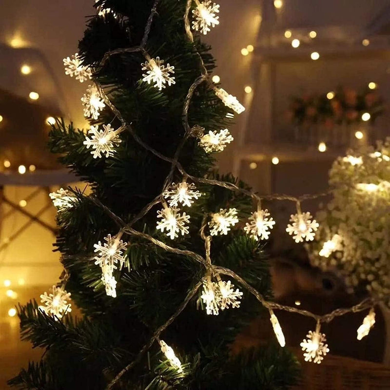 MILEXING Christmas Lights, Snowflake String Lights 19.6 Ft 40 LED Fairy Lights Battery Operated Waterproof for Xmas Garden Patio Bedroom Party Decor Indoor Outdoor Celebration Lighting (Warm Color) Home & Garden > Lighting > Light Ropes & Strings MILEXING   