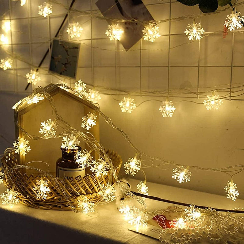 MILEXING Christmas Lights, Snowflake String Lights 19.6 Ft 40 LED Fairy Lights Battery Operated Waterproof for Xmas Garden Patio Bedroom Party Decor Indoor Outdoor Celebration Lighting (Warm Color) Home & Garden > Lighting > Light Ropes & Strings MILEXING   