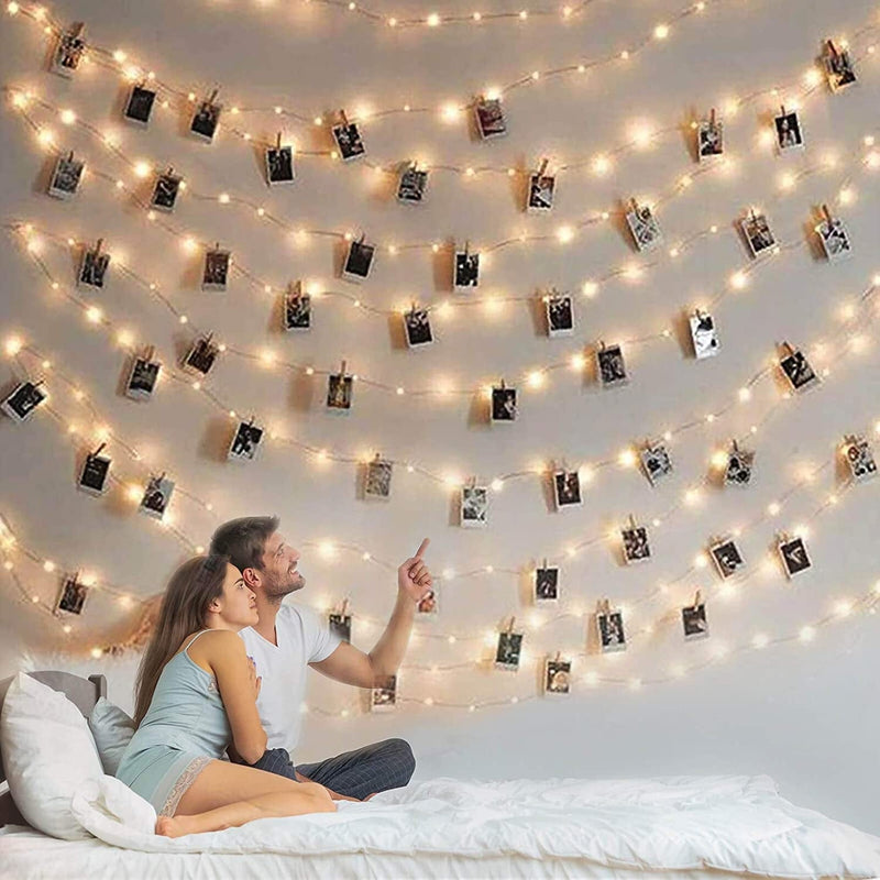 Photo Clip String Lights with Remote, 33FT 100 LED Fairy Lights Picture Clips, 8 Modes USB Powered String Light with 50 Clear Clips for Dorm, Bedroom, Christmas, Party, Wedding Decor (Warm White) Home & Garden > Lighting > Light Ropes & Strings BRYUBR Battery Powered  