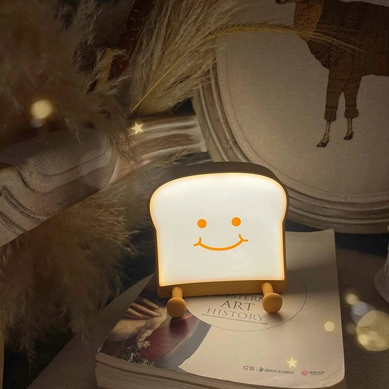QANYI Cute Night Light Toast Bread LED Night Lamp with Rechargeable and Timer, Portable Bedroom Bedside Bed Lamp Birthday Gifts Ideas for Tween Teenage Teenager Teen Girls Boy Kids Women Home & Garden > Lighting > Night Lights & Ambient Lighting QANYI funny smile  