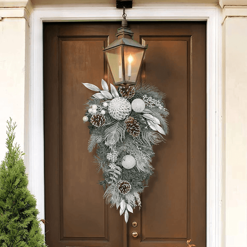Valery Madelyn Pre-Lit 17 inch Silver White Christmas Teardrop Swag with 20 LED Lights, Swag Decoration with Ball Ornaments and Pine Cone for Front Door Window Xmas Home Decor, Battery Operated Home & Garden > Decor > Seasonal & Holiday Decorations& Garden > Decor > Seasonal & Holiday Decorations Valery Madelyn   