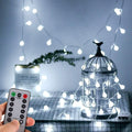 WERTIOO 33Ft 100 Leds Battery Operated String Lights Globe Fairy Lights with Remote Control for Outdoor/Indoor, Tent, Camping, Bedroom,Garden,Christmas Tree[8 Modes,Timer ] (Warm White) Home & Garden > Lighting > Light Ropes & Strings WERTIOO White  
