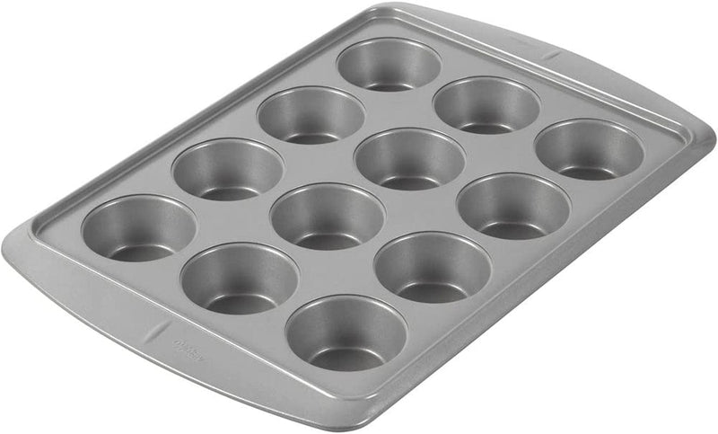 Wilton Ever-Glide Muffin Pan, Enjoy Warm Homemade Muffins Right Out of Your Oven, Great for Cupcakes, Roasted Veggies, Shredded Potato Egg Cups and More, 12 Cup Home & Garden > Kitchen & Dining > Cookware & Bakeware Wilton   