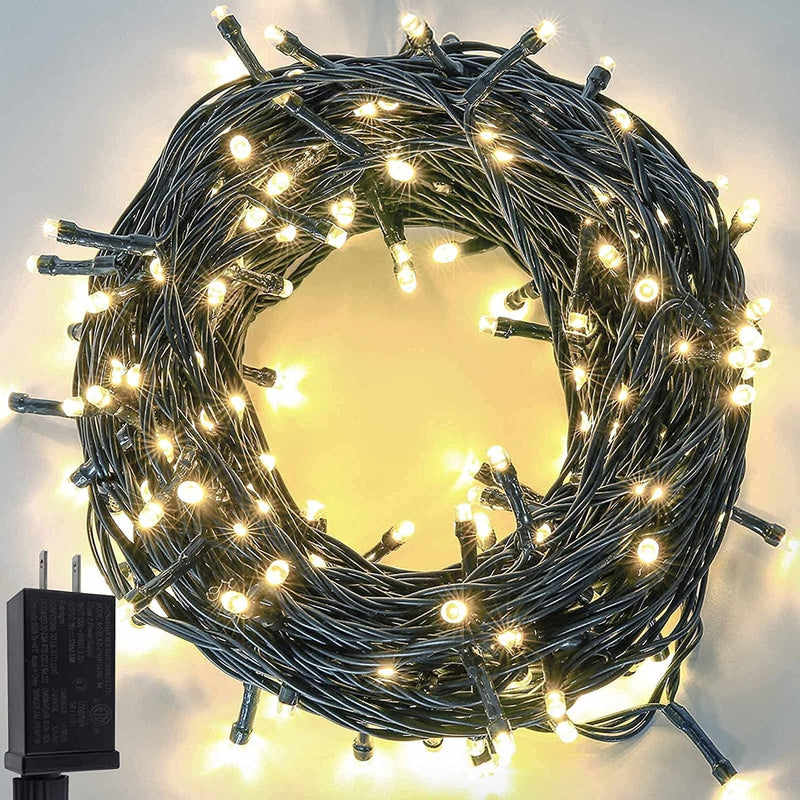 YIQU Upgraded 82FT 200 LED Christmas String Lights Outdoor/Indoor, Extendable Green Wire, Super Bright with 8 Modes, Waterproof Fairy String Lights for Xmas Tree Holiday Party Garden (Warm White) Home & Garden > Lighting > Light Ropes & Strings Zhongshan MLS Electronics Co., LTD. Warm White 240LED 